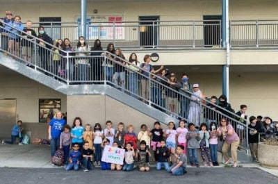 Students posing outside of Bryant School